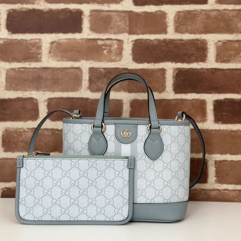 G*u*i shopping bags